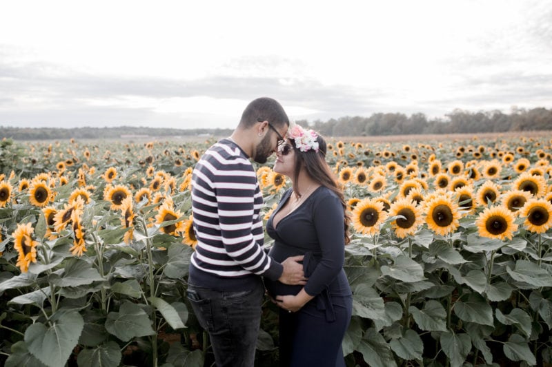 Newborn Photography, Couple standing out in a sunflower field