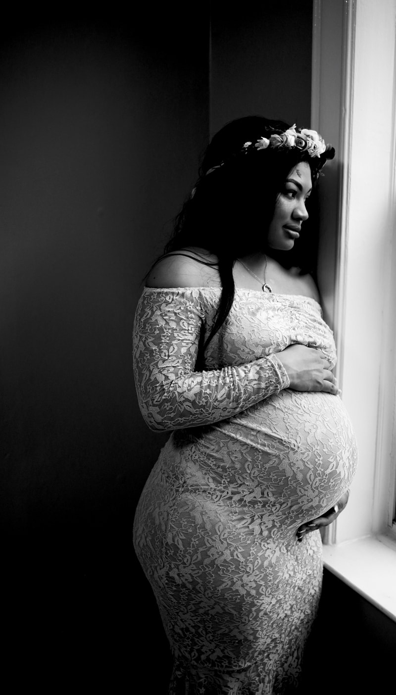 Maternity Photography, black and white of woman with floral crown