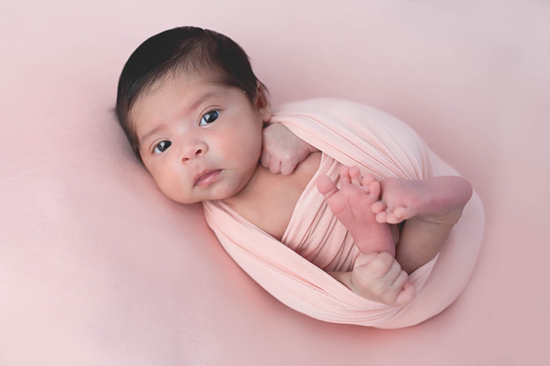 Newborn Photography, baby wrapped in blush blanket