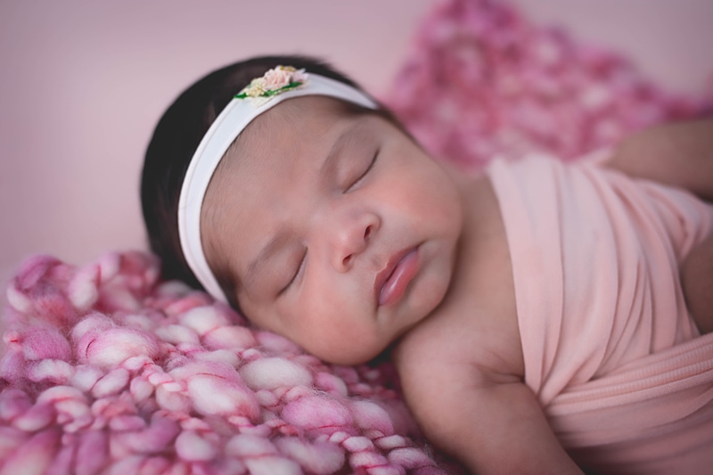Newborn Photography, baby girl wrapped in pink