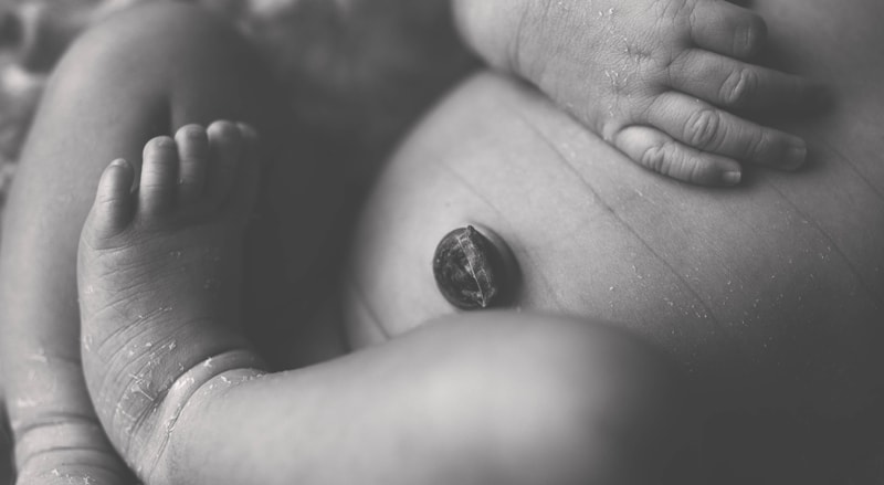 Newborn Photography, close up of newborn's belly button