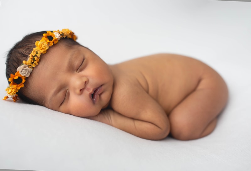Newborn Photography, baby with yellow flower crown