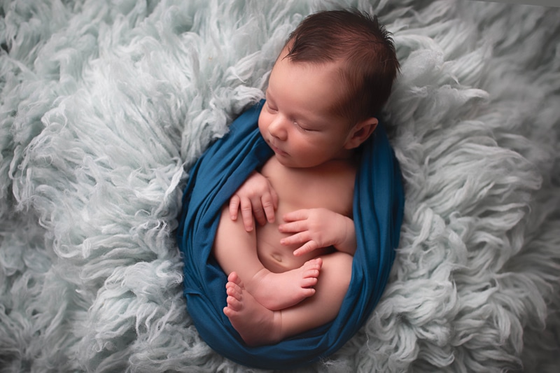 Newborn Photography, baby wrapped in blue