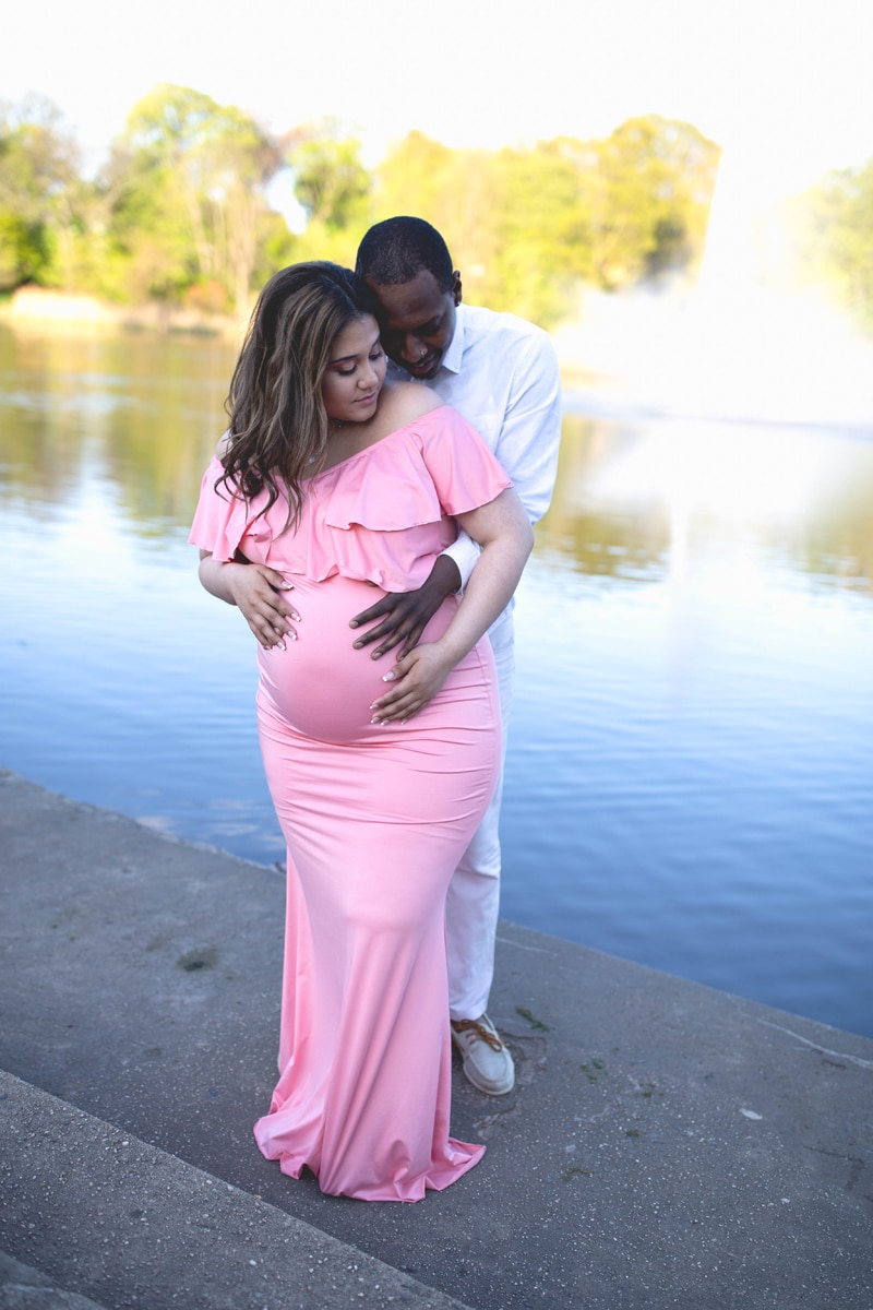Maternity Photography, man holding woman in pink